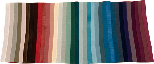 Photo of a muted color analysis tool. It is a fabric flag showing the muted color palette.